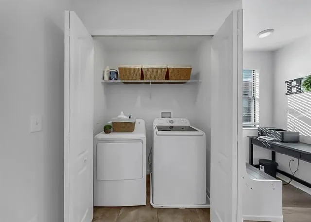 a bathroom with a sink toilet and a mirror