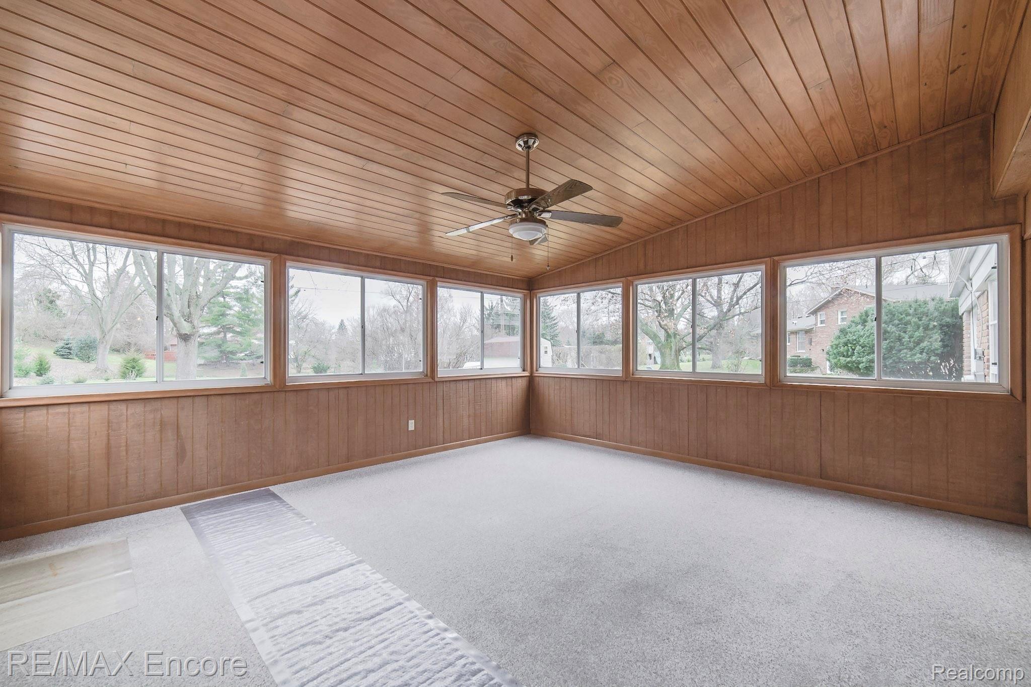 4288 Fieldbrook Road West Bloomfield, MI 48323 - Photo 17 of 49 Enjoy 3 season entertaining in the gorgeous Florida room with vaulted ceilings and carpet.