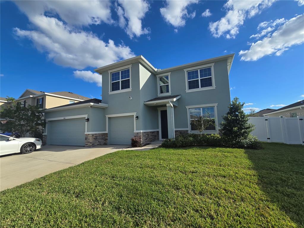 5846 Southwest 80th Lane Ocala, FL 34476 - Photo 1 of 27 a view of a yard in front of house