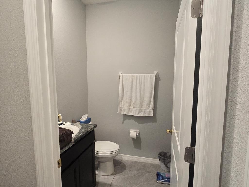 5846 Southwest 80th Lane Ocala, FL 34476 - Photo 16 of 27 a bathroom with a toilet and a sink