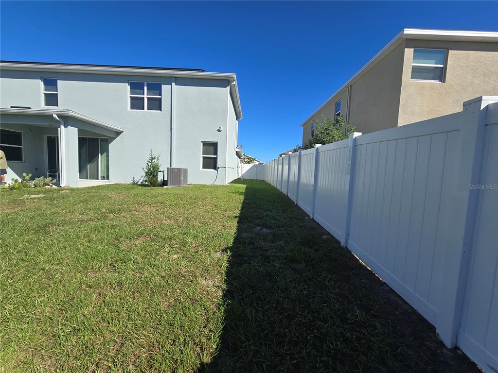 5846 Southwest 80th Lane Ocala, FL 34476 - Photo 6 of 27 a view of a house with backyard