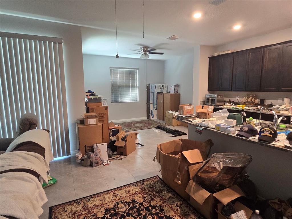 5846 Southwest 80th Lane Ocala, FL 34476 - Photo 10 of 27 a room with furniture or chandelier and a window