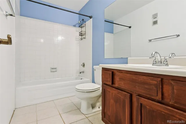 a bathroom with a sink a toilet and a bathtub