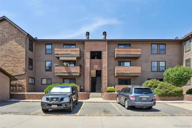 a car parked in front of a building