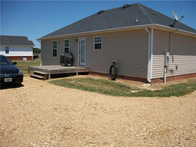 5 Myrick Road Flintville, TN 37335 - Photo 2 of 13 a view of a house with backyard and sitting area