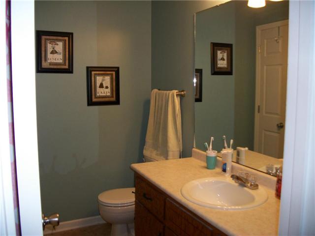5 Myrick Road Flintville, TN 37335 - Photo 9 of 13 a bathroom with a sink toilet and a mirror