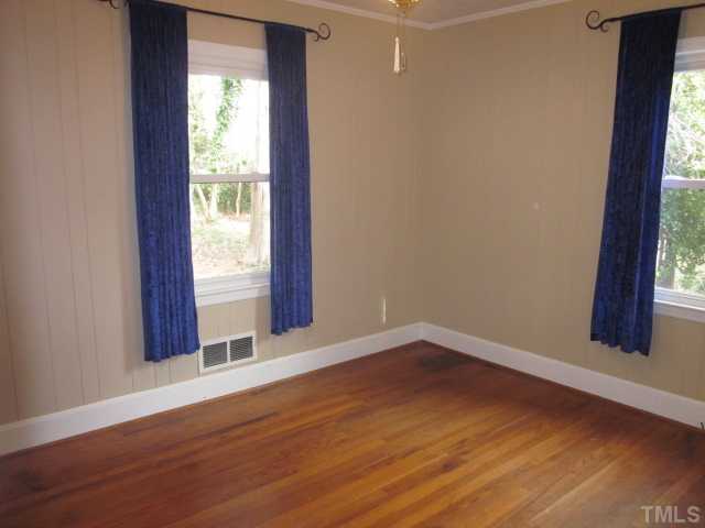 5316 Barclay Drive Raleigh, NC 27606 - Photo 19 of 25 Lovely master bedroom features ceiling fan and hardwoods! New paint January 2011! All closets are cedar lined! Home features include linen closet as well!