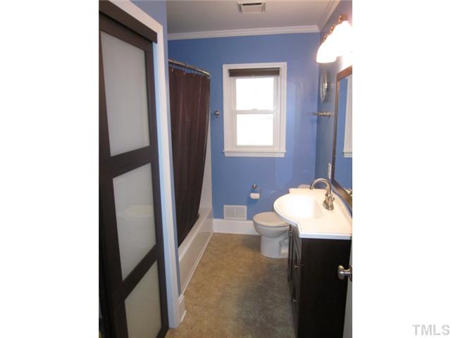 5316 Barclay Drive Raleigh, NC 27606 - Photo 20 of 25 Bathroom has been redone top to bottom! Bathroom features include new sink, faucet, new paint, new flooring and new fixtures! Linen closet included as well!