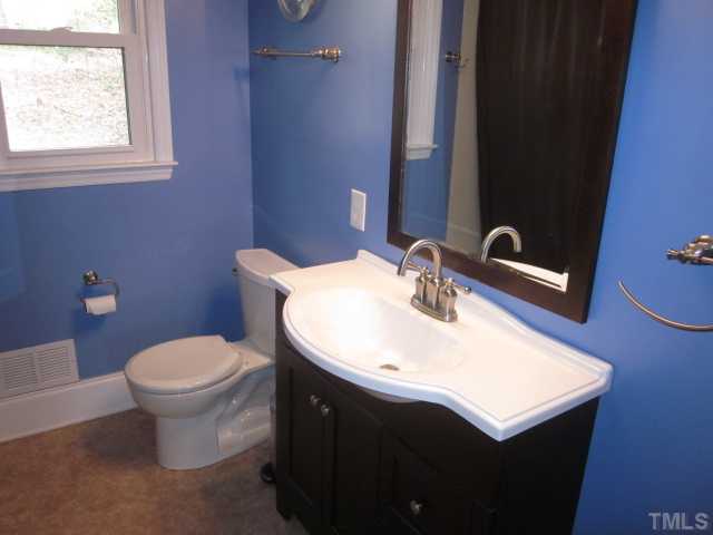 5316 Barclay Drive Raleigh, NC 27606 - Photo 21 of 25 Here is another view of your new completely redone bathroom! New sink, new faucet, new paint, new flooring, new fixtures and a linen closet!