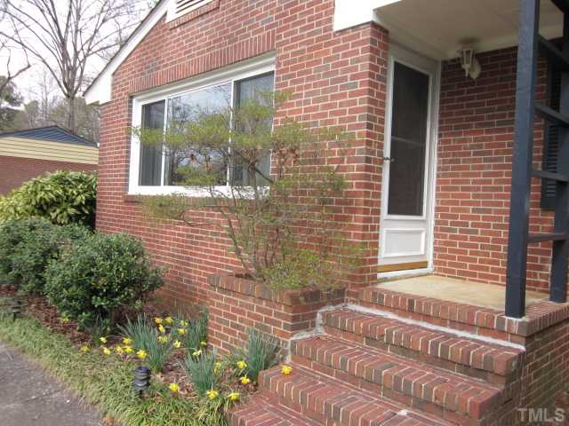 5316 Barclay Drive Raleigh, NC 27606 - Photo 4 of 25 Lovely view of the front door to this adorable brick ranch home! Nice covered front porch entry! Great first home with lots of updates! Great investor property as well! Fabulous location, convenient to shopping, sports arenas, and highways!