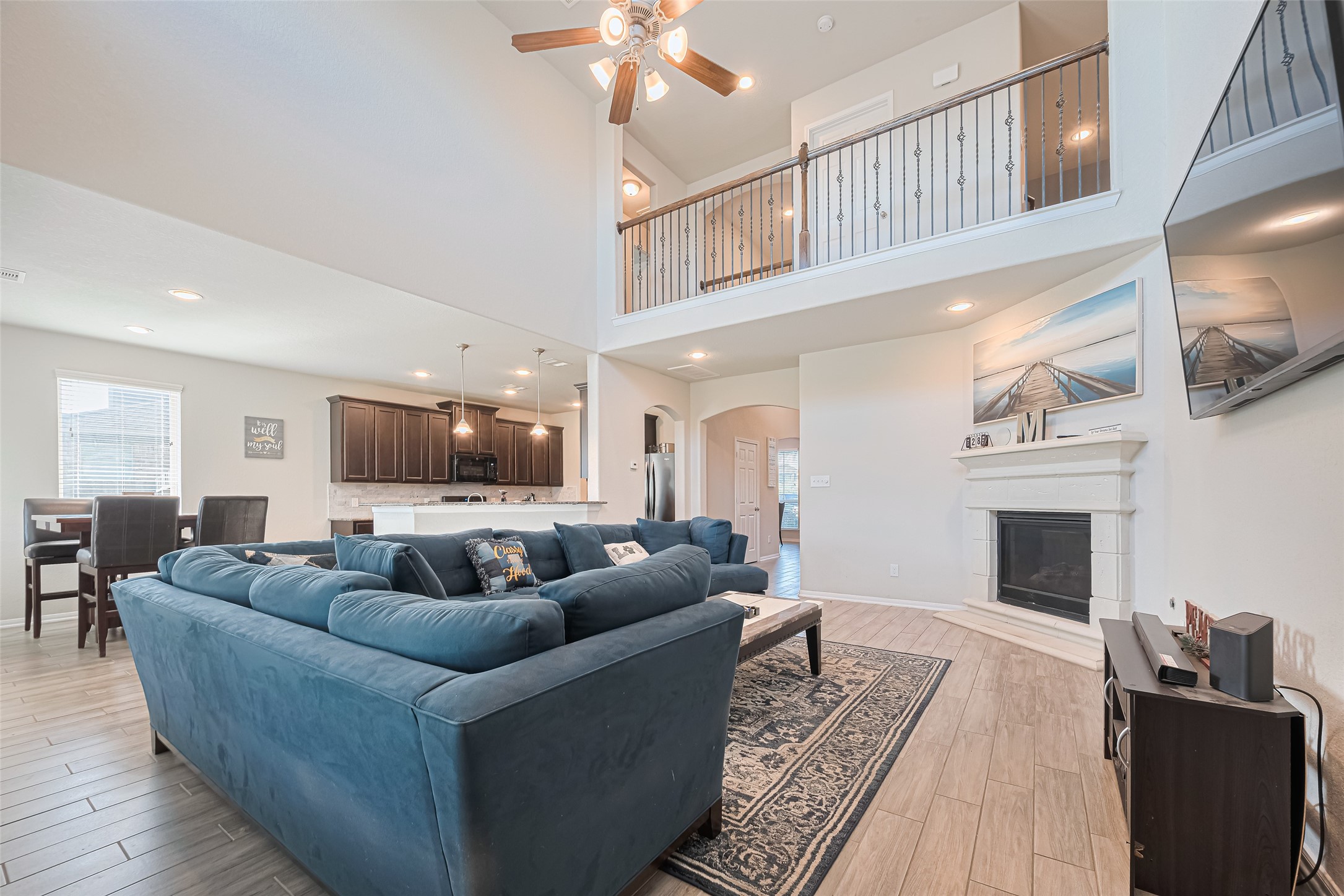 4507 Shallow Hill Court Houston, TX 77084 - Photo 11 of 50 a living room with furniture and a fireplace