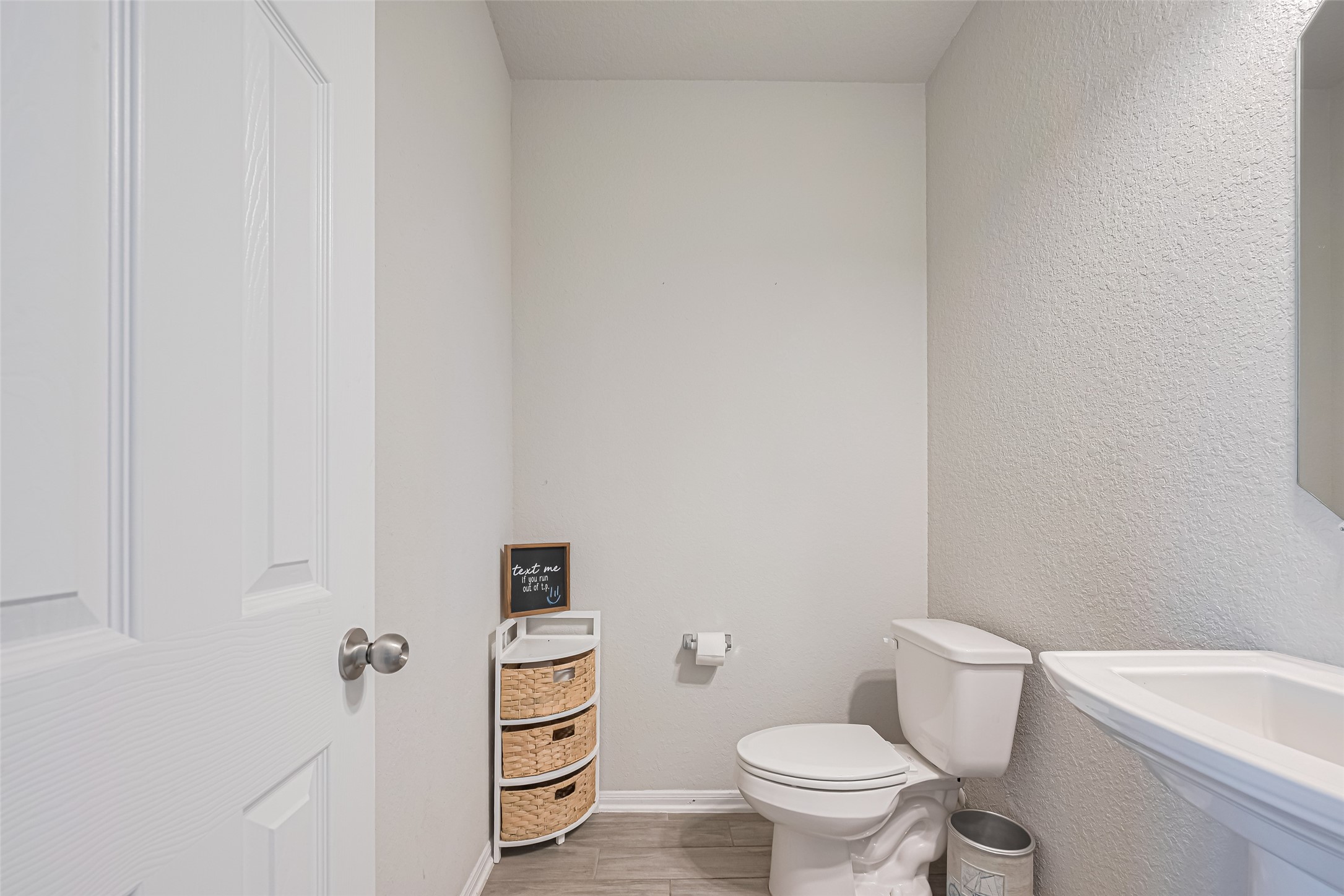 4507 Shallow Hill Court Houston, TX 77084 - Photo 20 of 50 a white toilet sitting next to a bathroom sink
