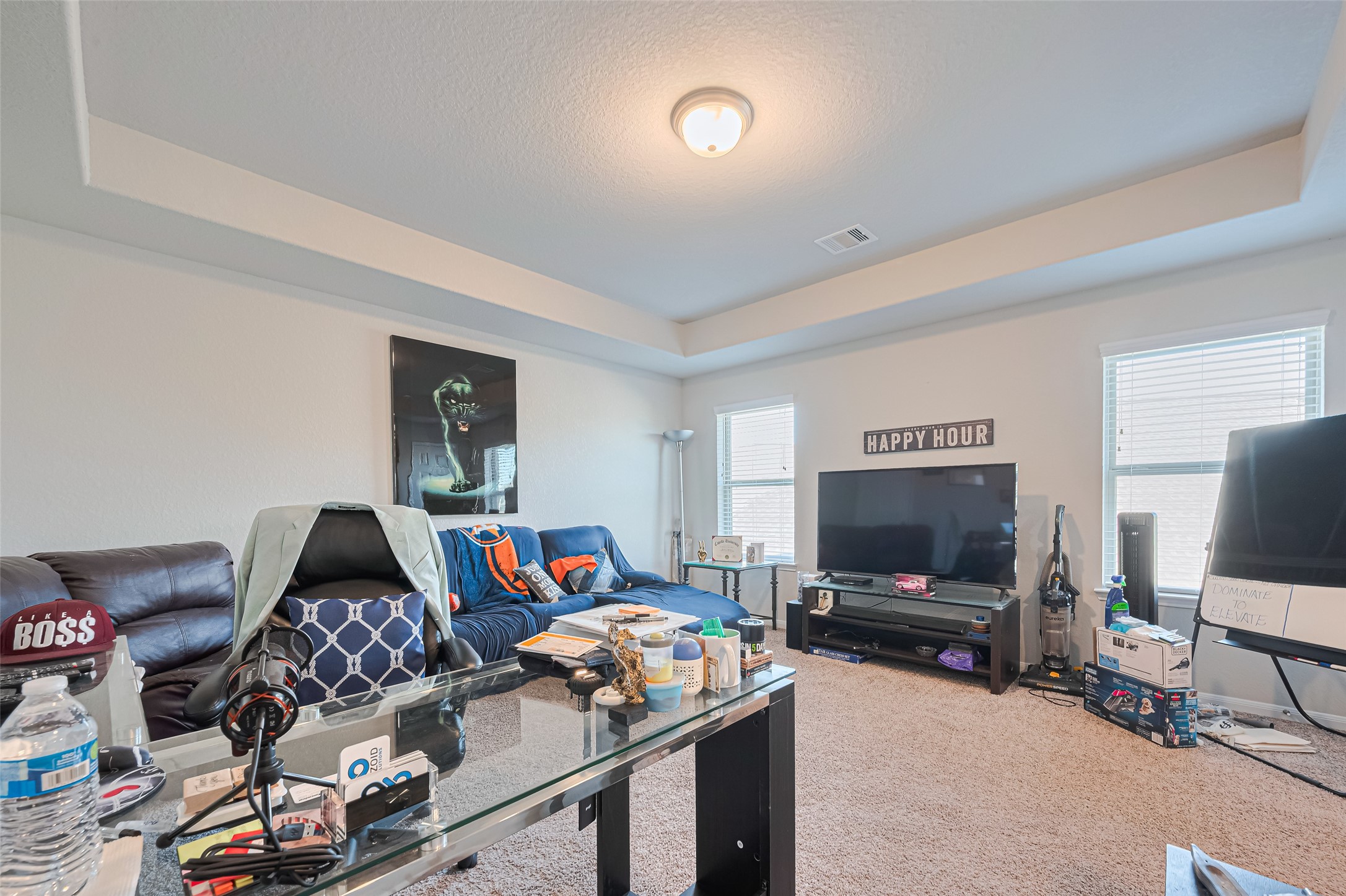 4507 Shallow Hill Court Houston, TX 77084 - Photo 29 of 50 a bedroom with furniture and a flat screen tv
