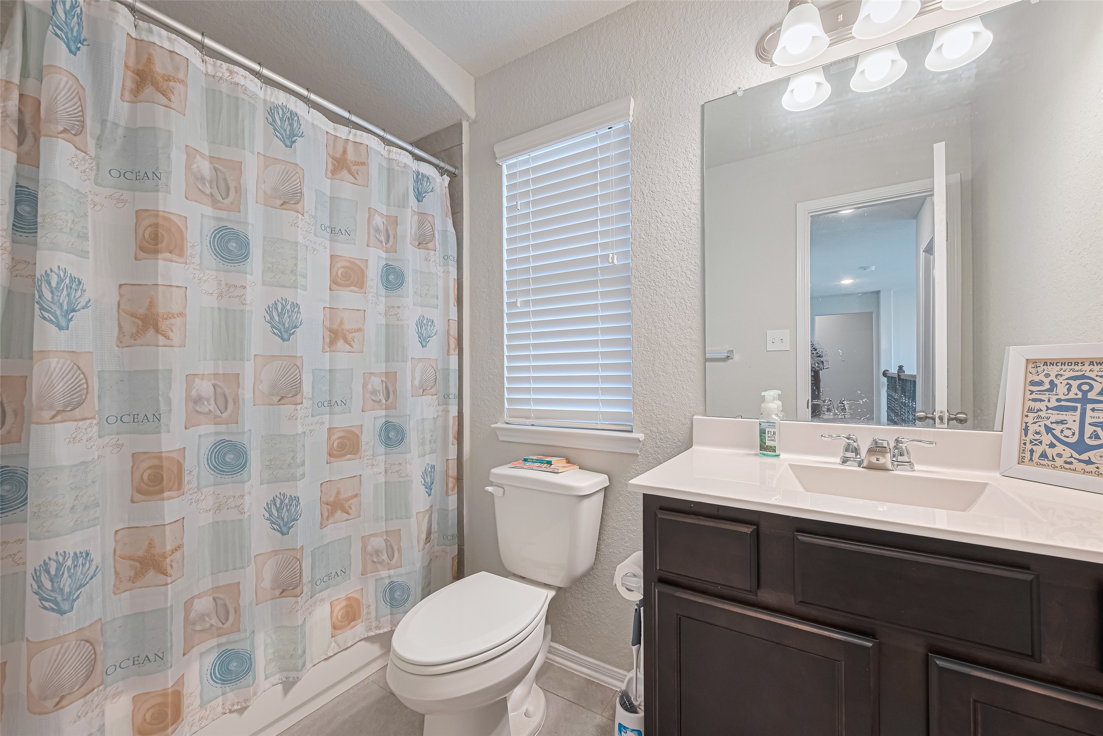 4507 Shallow Hill Court Houston, TX 77084 - Photo 30 of 50 a bathroom with a double vanity sink toilet and a mirror