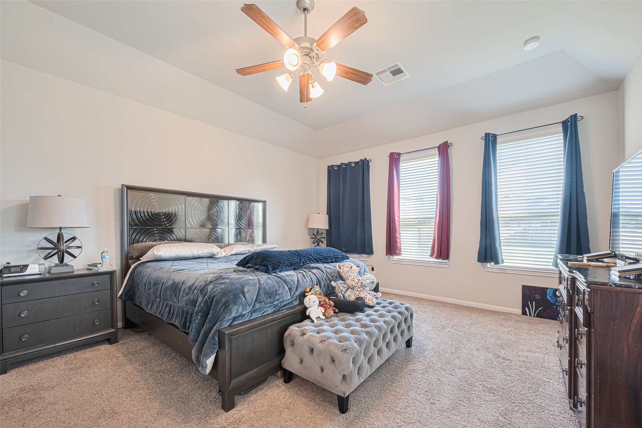 4507 Shallow Hill Court Houston, TX 77084 - Photo 33 of 50 a bedroom with a bed and a couch