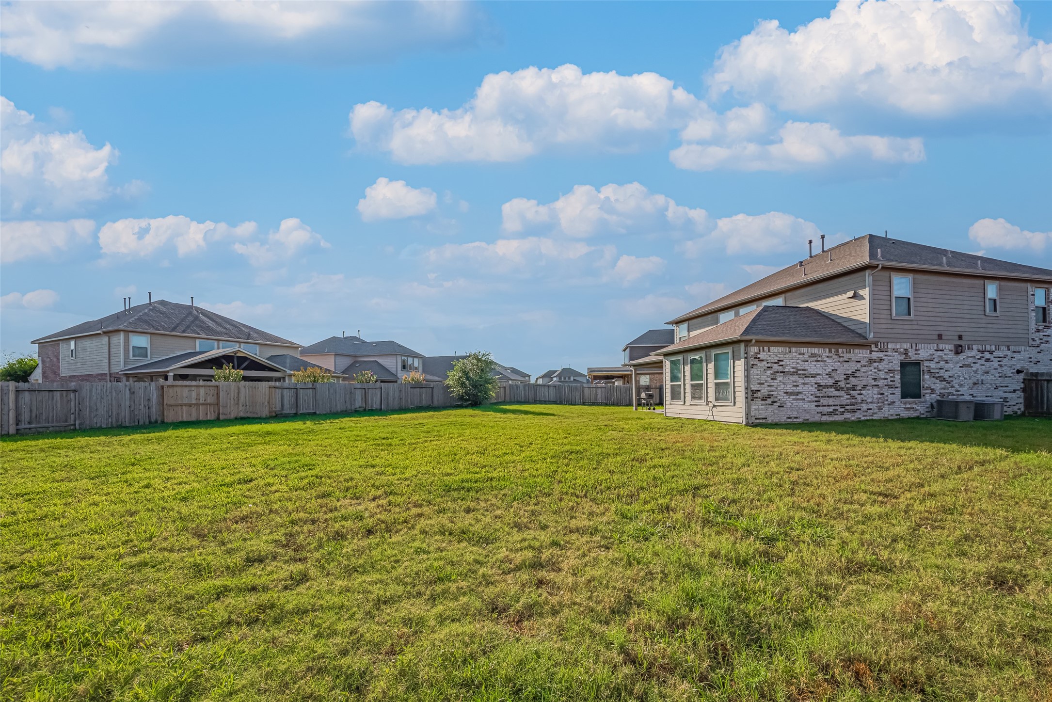 4507 Shallow Hill Court Houston, TX 77084 - Photo 40 of 50 a view of a house with a yard