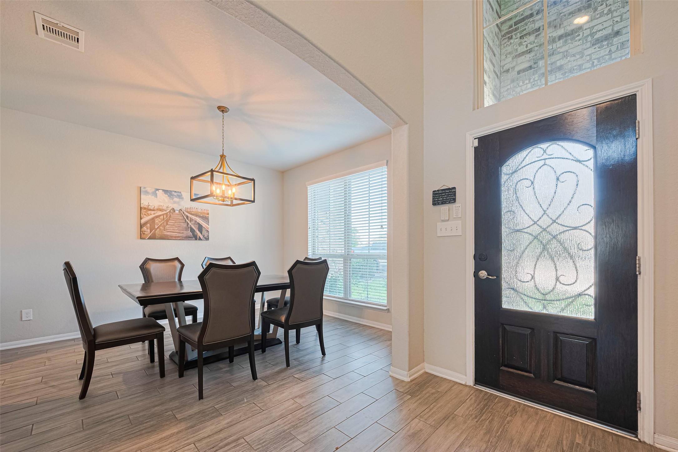 4507 Shallow Hill Court Houston, TX 77084 - Photo 6 of 50 a view of a dining room with furniture window and wooden floor