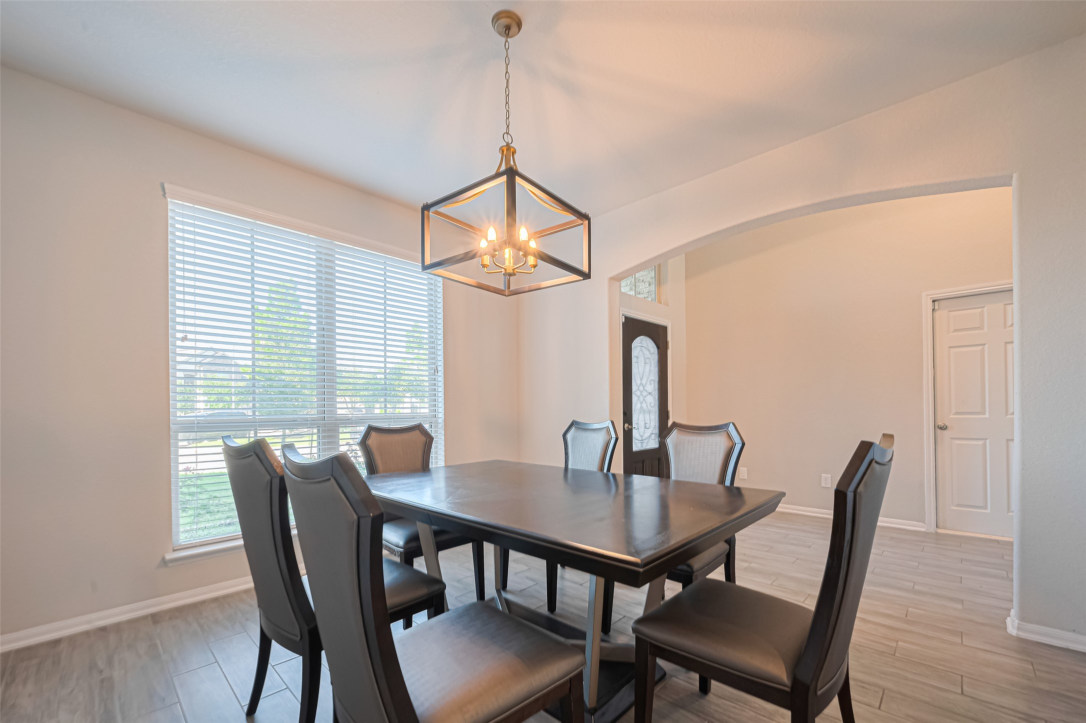 4507 Shallow Hill Court Houston, TX 77084 - Photo 7 of 50 a view of a dining room with furniture window and wooden floor