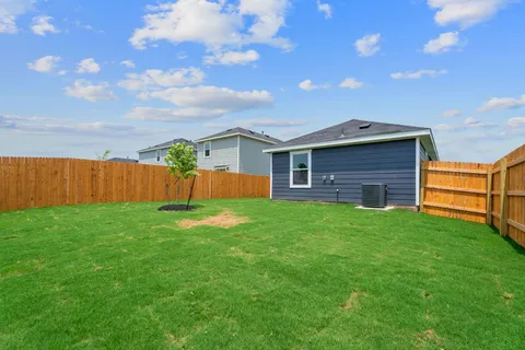 a view of a backyard with a garden