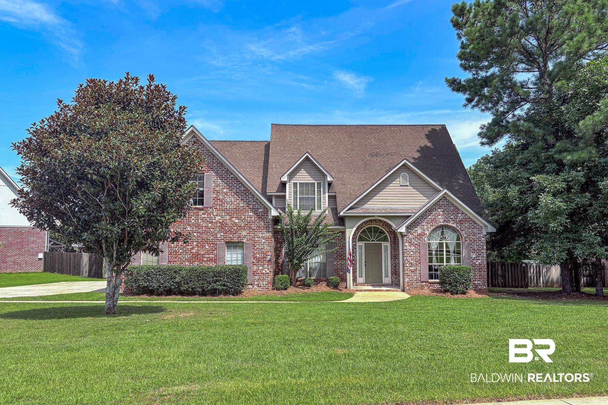8421 Weatherford Court Daphne, AL 36527 - Photo 1 of 36 Traditional home with brick siding and a shingled roof