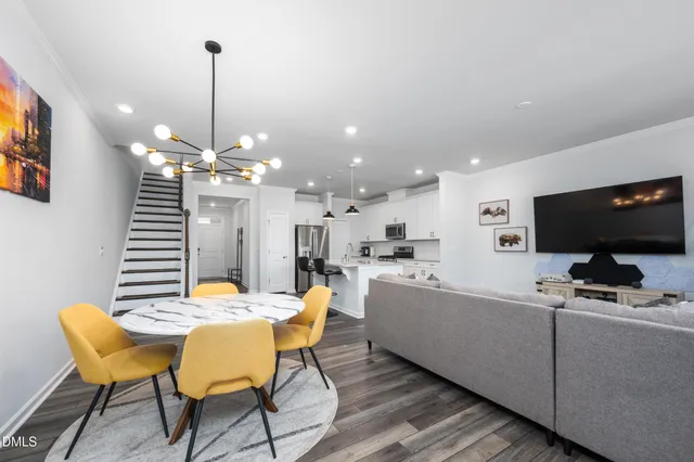 a view of a dining room with furniture