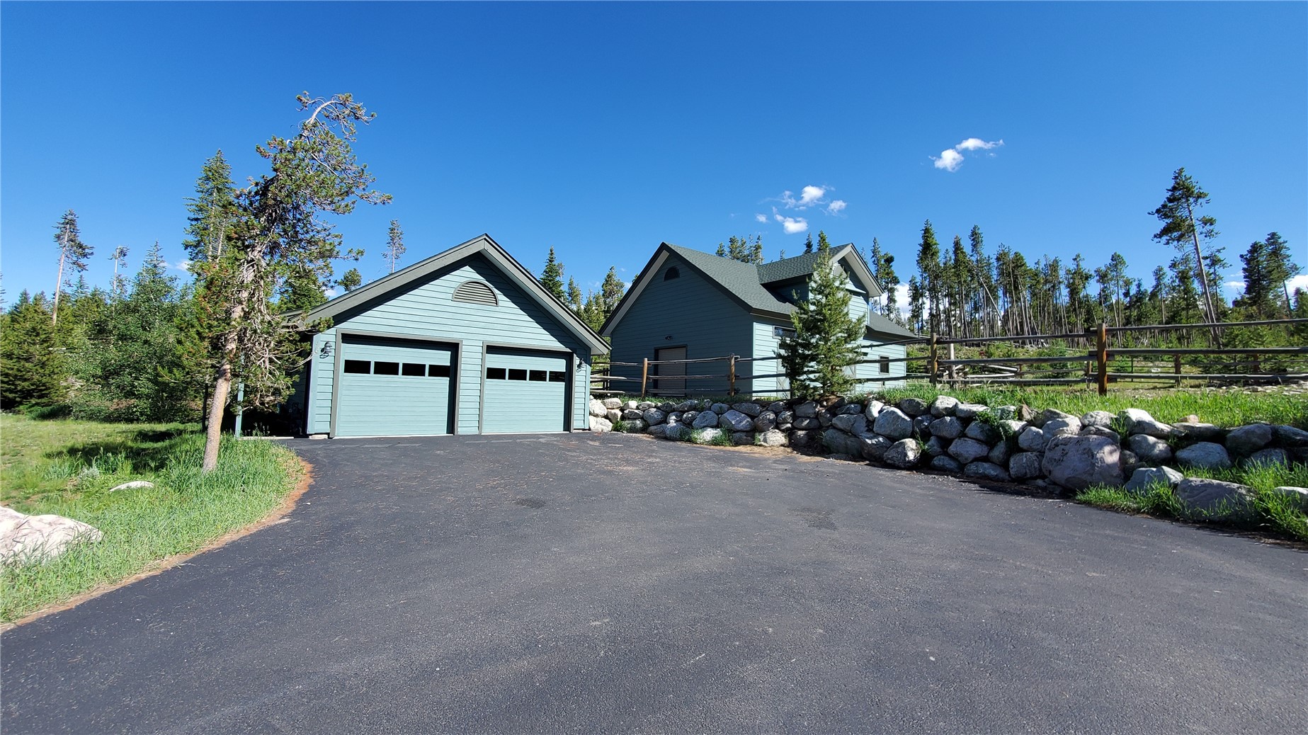1228 Emerald Road Silverthorne, CO 80498 - Photo 44 of 50 A detached 2 car garage has a large workshop