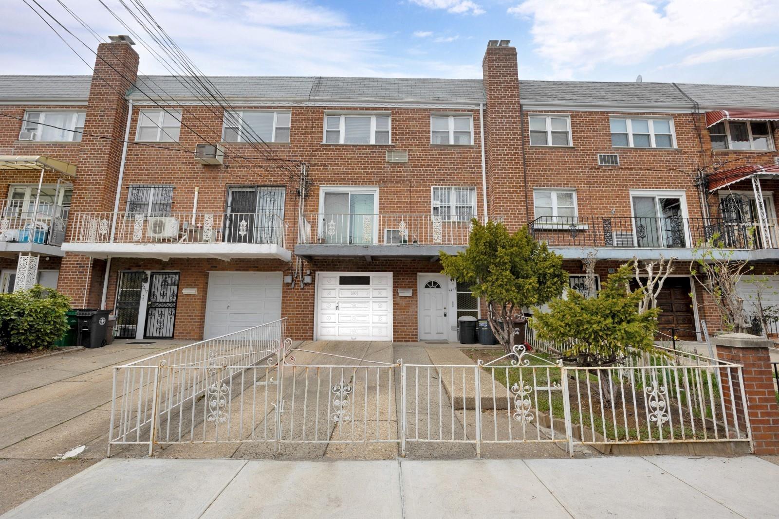 a front view of a building with balcony
