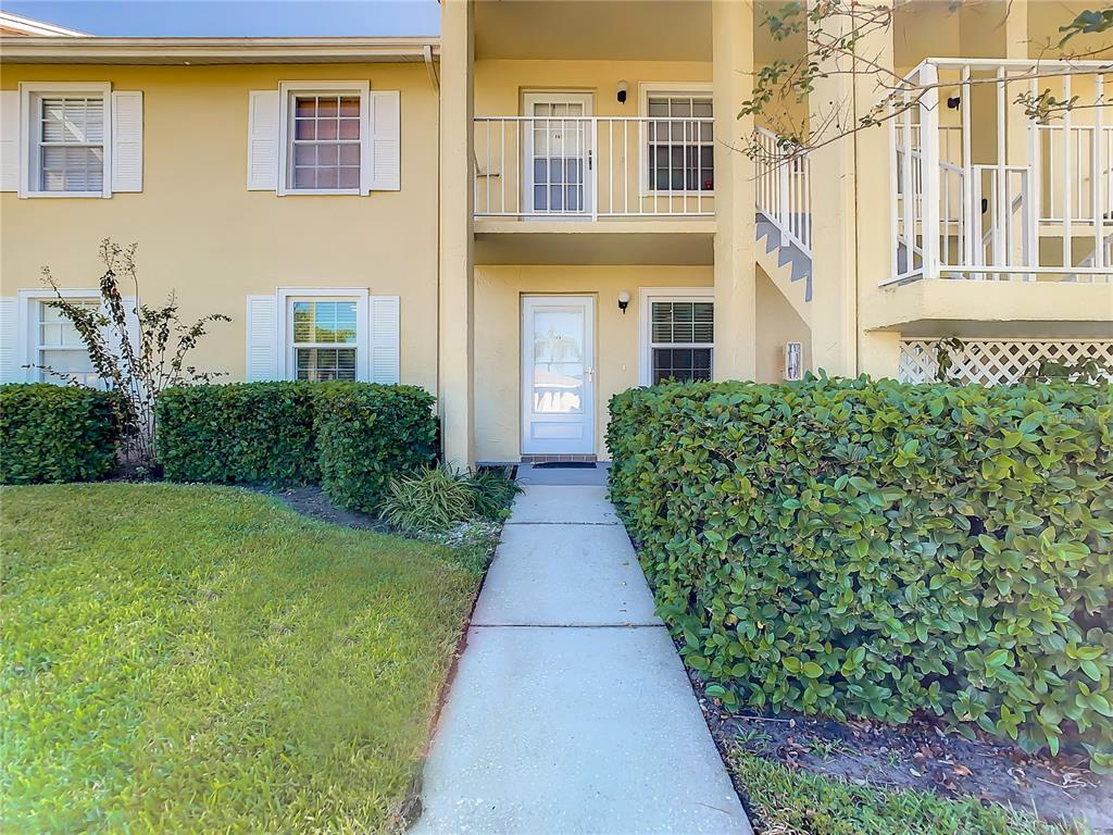 95 Promenade Drive, Unit 103 Dunedin, FL 34698 - Photo 1 of 1 a view of a back yard of the house