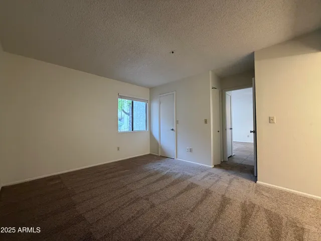 a view of an empty room and window