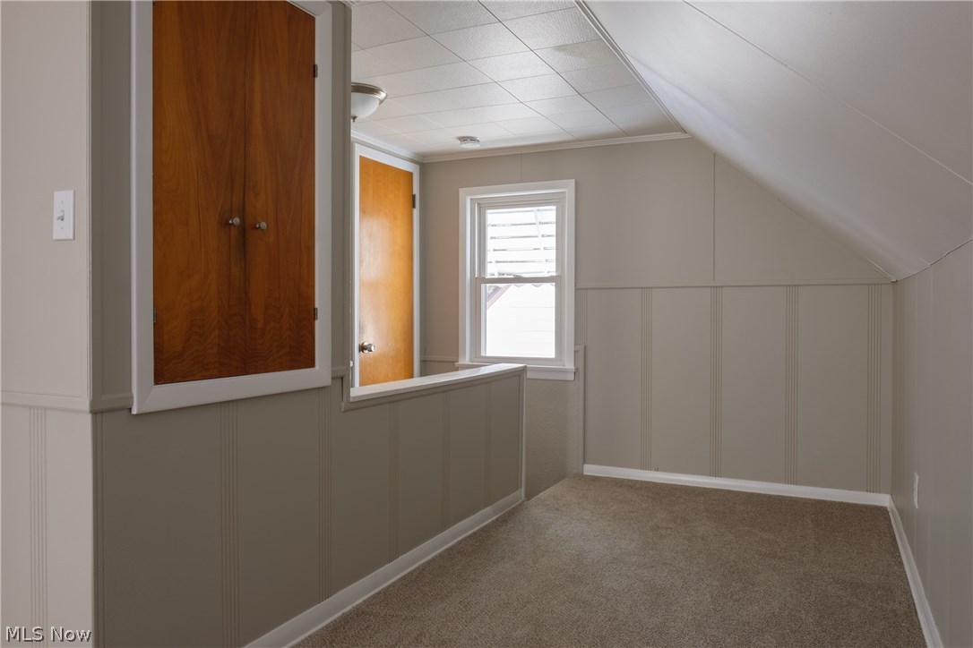 13909 Granger Road Cleveland, OH 44125 - Photo 20 of 35 Stair landing to master bedroom - note the built-in cabinet (left, near) and walk-in closet (left, far)