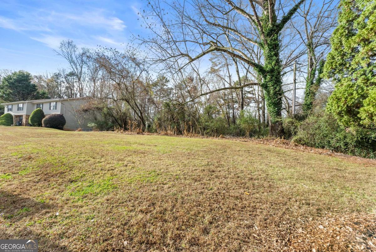 2486 Hidden Cove Court Gainesville, GA 30501 - Photo 3 of 13 a view of swimming pool with an outdoor space
