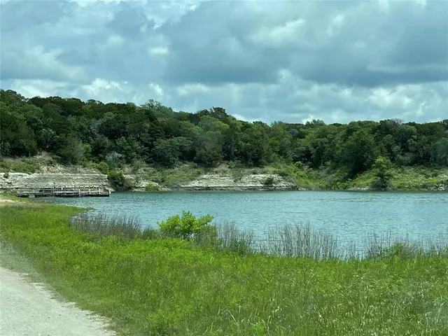 a view of outdoor space with deck and green space