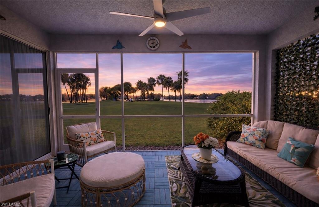 1945 Crestview Way, Unit 165 Naples, FL 34119 - Photo 1 of 45 a outdoor space with patio couch and a potted plant