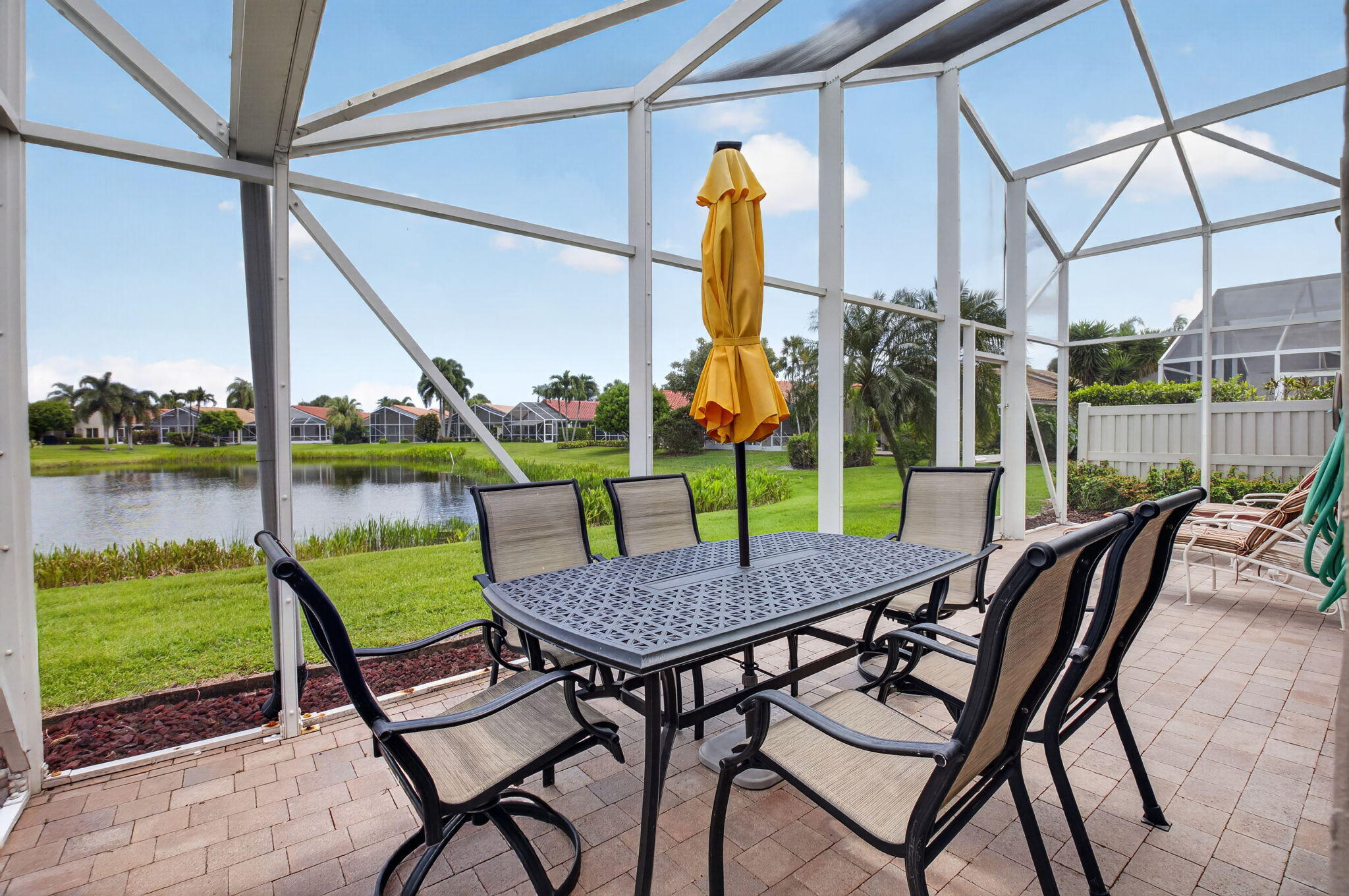 11592 Lawton Road Boynton Beach, FL 33437 - Photo 30 of 96 Screened in Extended Patio