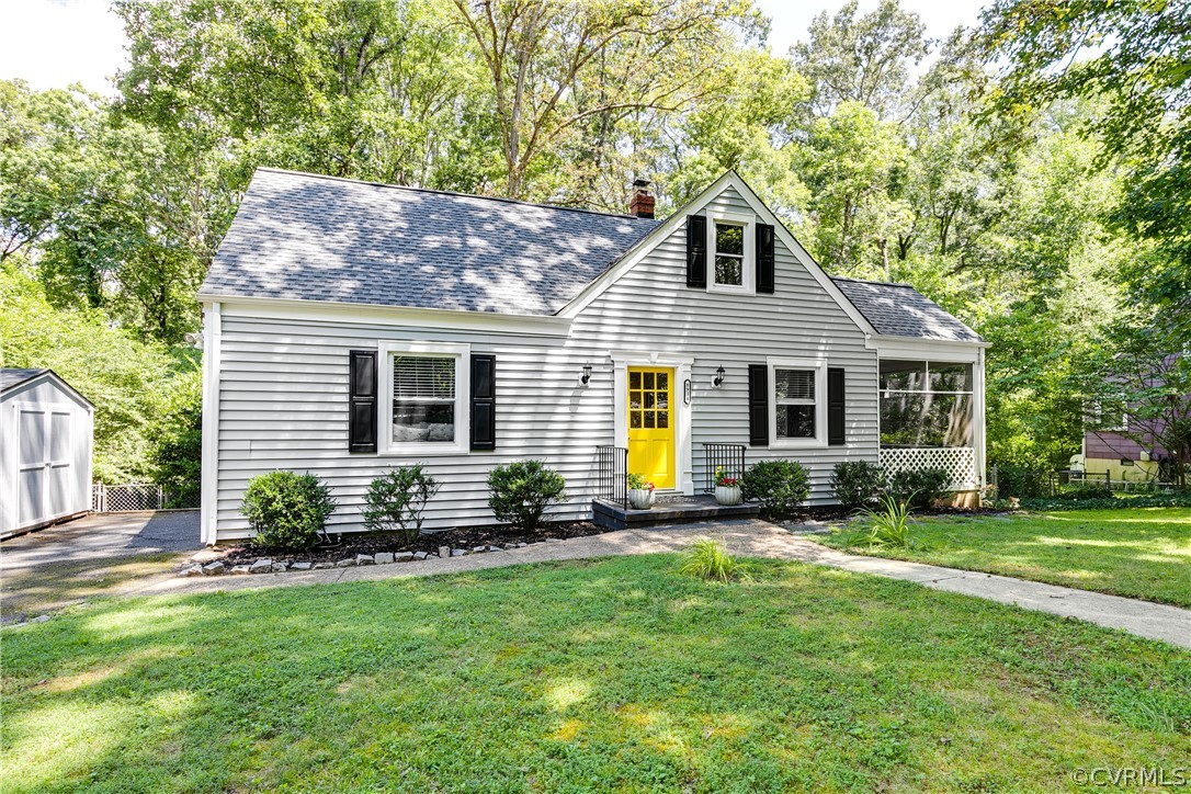8934 Elm Road Richmond, VA 23235 - Photo 3 of 37 a front view of a house with a yard