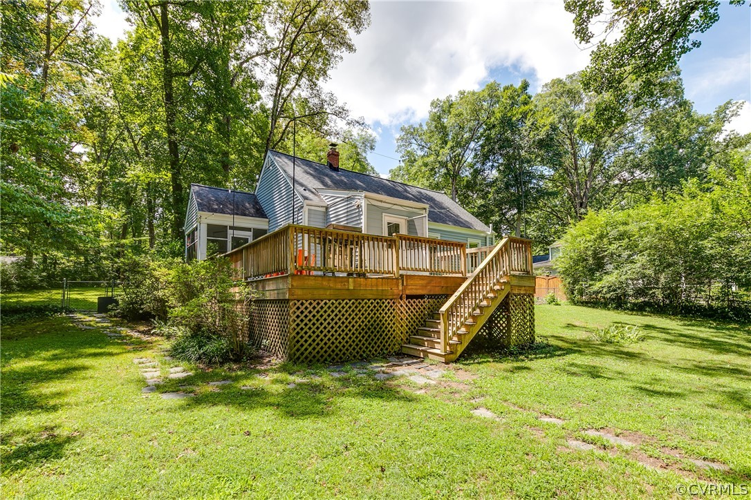 8934 Elm Road Richmond, VA 23235 - Photo 32 of 37 a view of a house with a yard