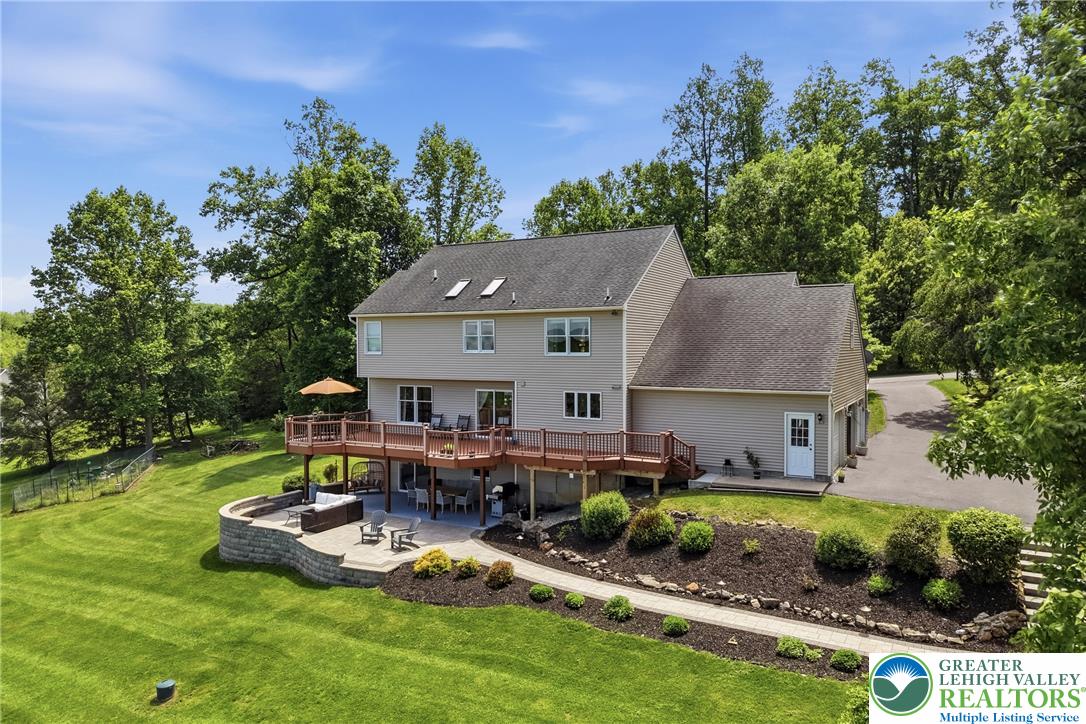 115 West Butternut Road Hellertown, PA 18055 - Photo 68 of 97 A spacious home with a multi-level deck offers generous outdoor living and entertaining spaces.