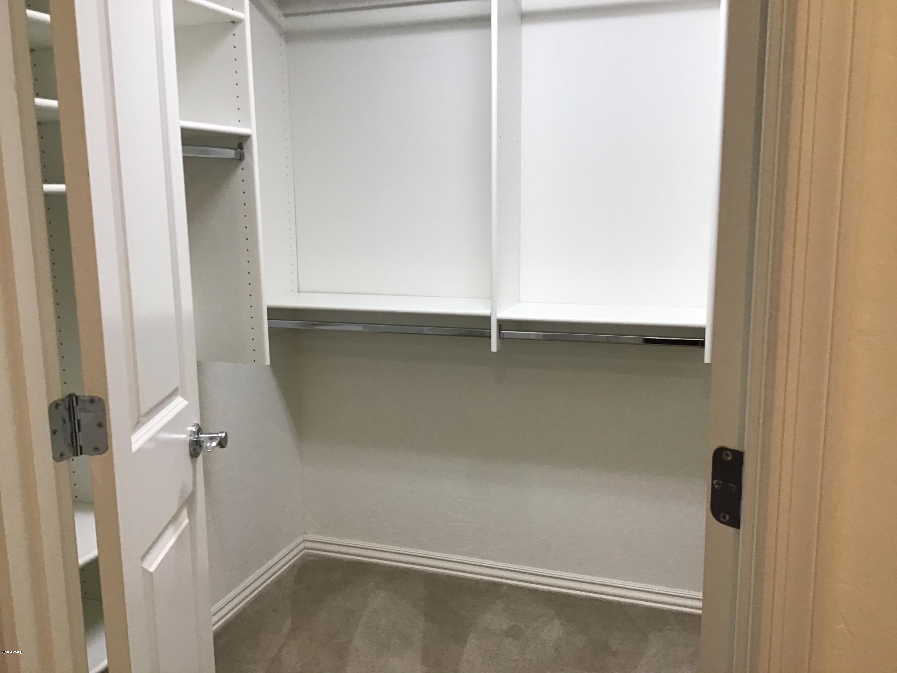 3935 East Rough Rider Road, Unit 1318 Phoenix, AZ 85050 - Photo 16 of 20 RRmastercloset