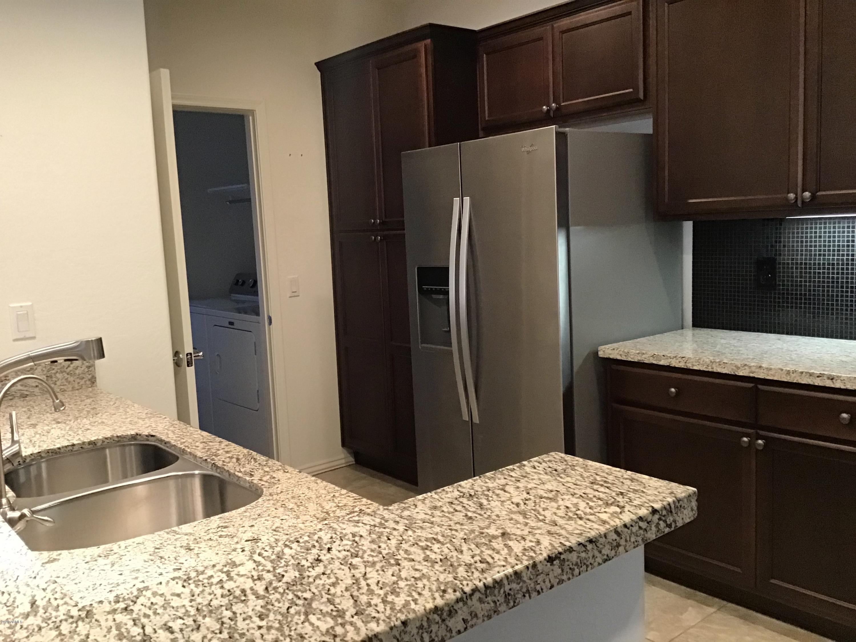 3935 East Rough Rider Road, Unit 1318 Phoenix, AZ 85050 - Photo 5 of 20 RRkitchen3