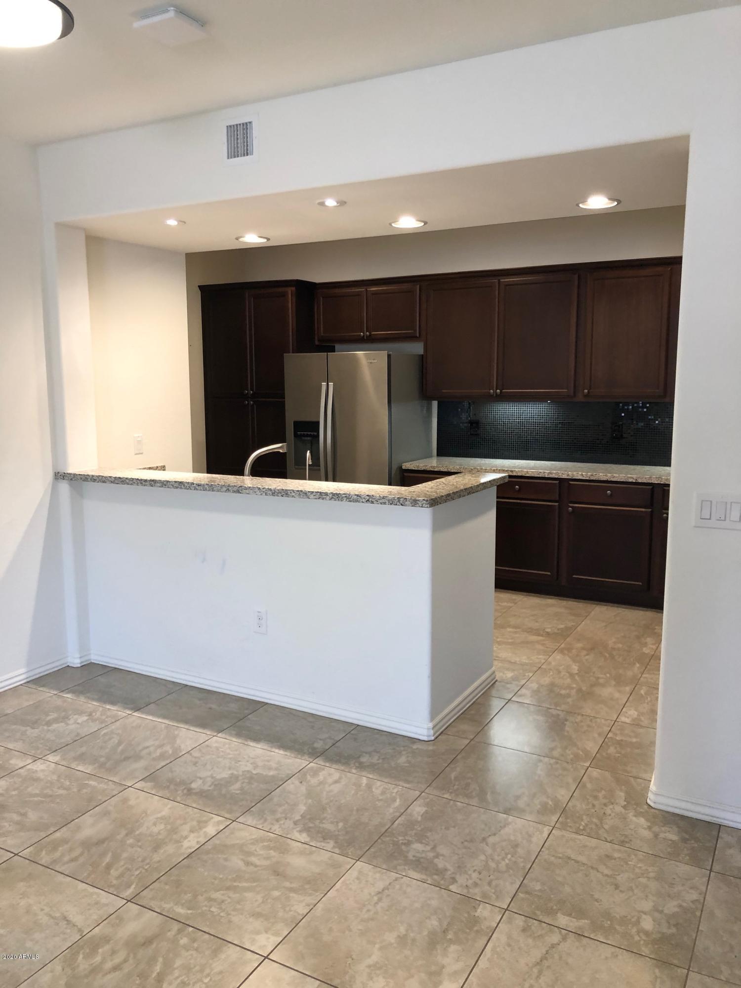 3935 East Rough Rider Road, Unit 1318 Phoenix, AZ 85050 - Photo 8 of 20 RRkitchen1