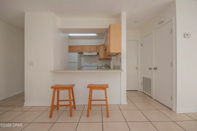 $189,000 | 7125 North Lagoon Drive, Unit J, Panama City, FL 32408
