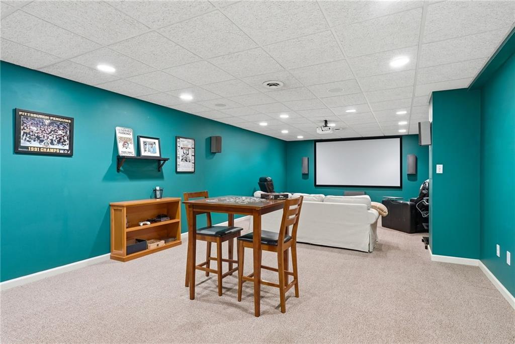 900 Settlers Ridge Road Pittsburgh, PA 15238 - Photo 37 of 50 Whether hosting a watch party, gaming with friends, or settling in for a movie night, the fully equipped media room is designed for entertainment.