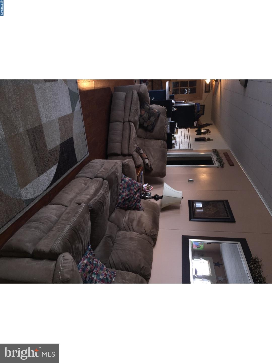 143 Barry Road Ashland, PA 17921 - Photo 8 of 21 a living room with furniture and wooden floor