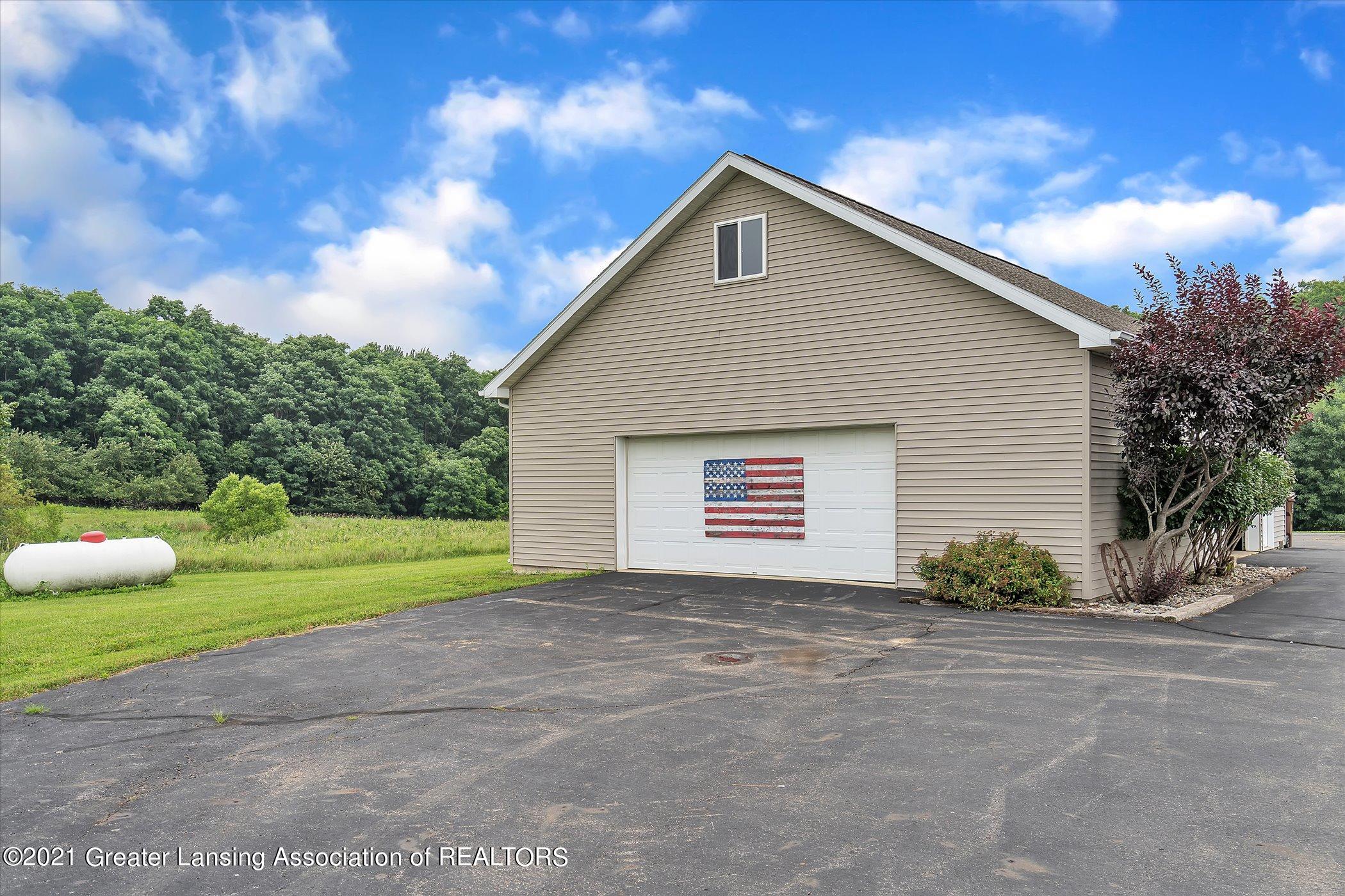 9101 Tucker Road Eaton Rapids, MI 48827 - Photo 36 of 43 36-9101 Tucker Rd-windowstill-realestate