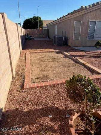 a view of a house with swimming pool in front of it