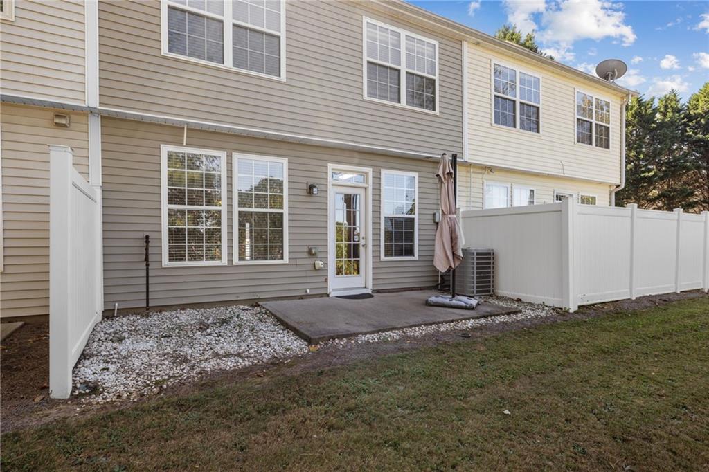1558 Paramount View Trace Northeast Sugar Hill, GA 30518 - Photo 20 of 21 a house view with a backyard space