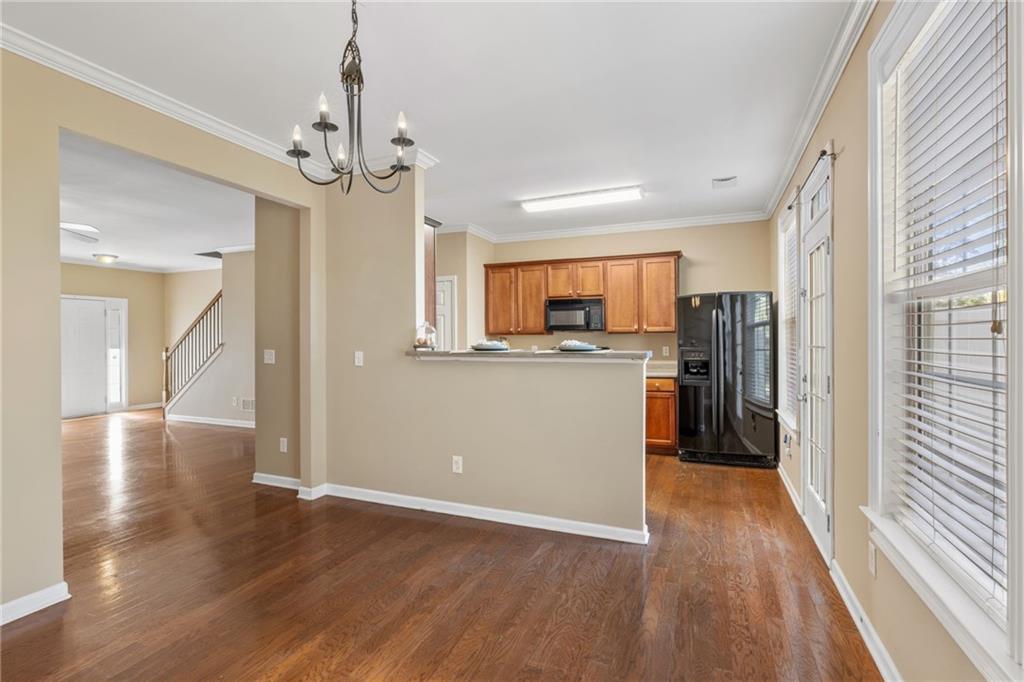 1558 Paramount View Trace Northeast Sugar Hill, GA 30518 - Photo 7 of 21 a view of a kitchen from the hallway