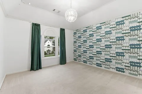 a view of empty room with windows