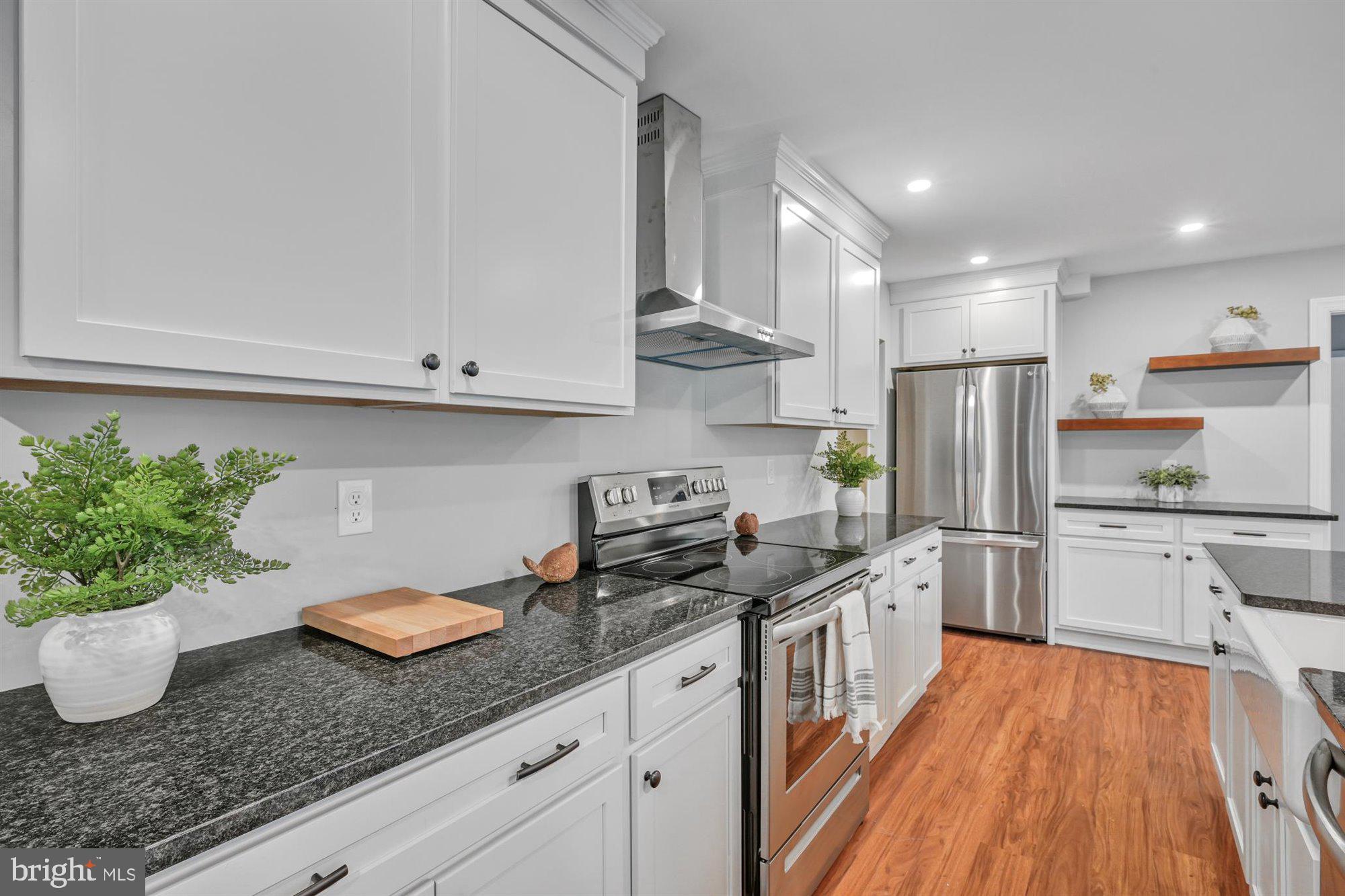 316 Lucas Road Phoenixville, PA 19460 - Photo 8 of 62 Kitchen with Granite Counters & New SS Appliances