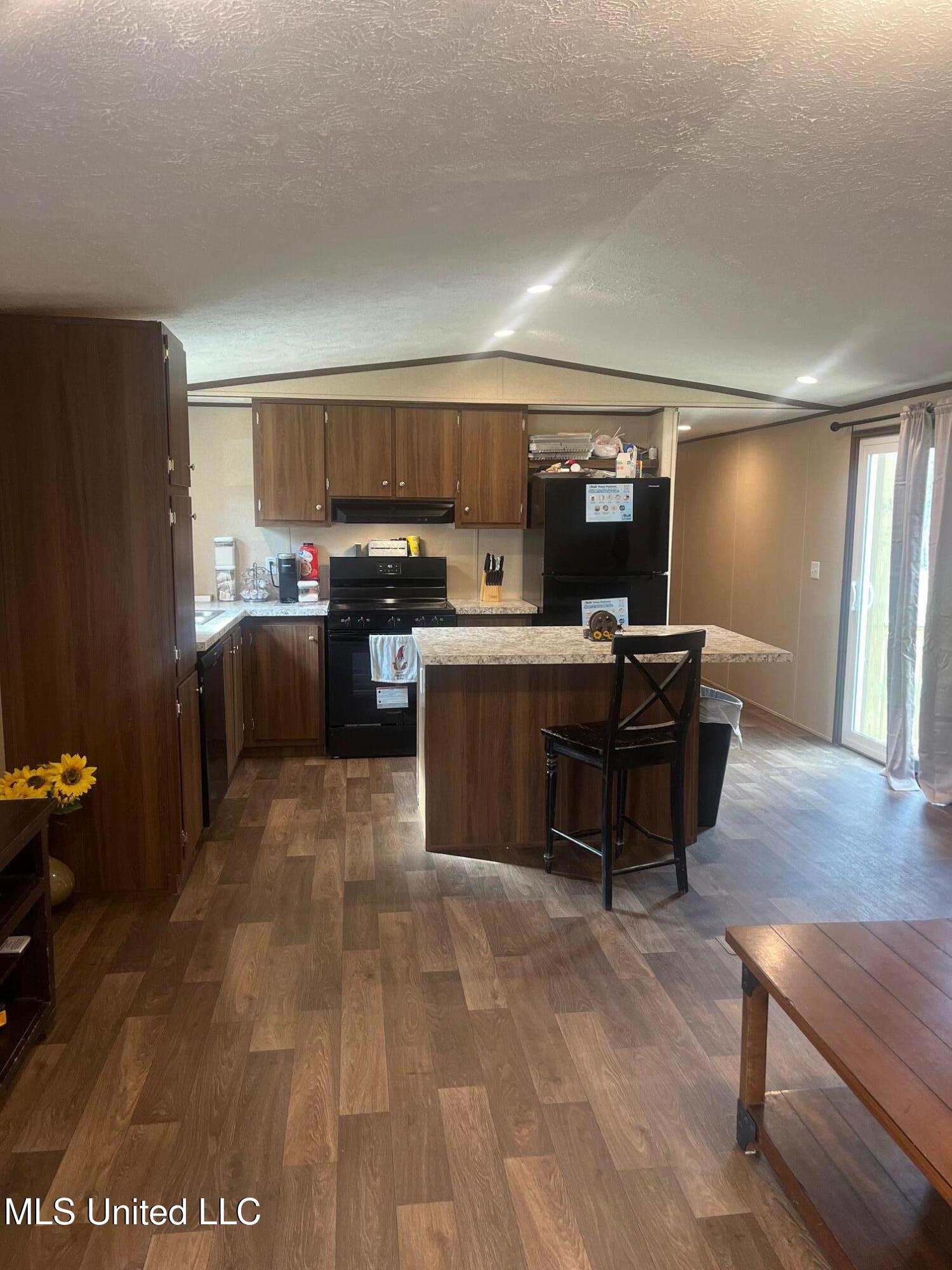 1725 McClyde Road Como, MS 38619 - Photo 4 of 15 kitchen/den